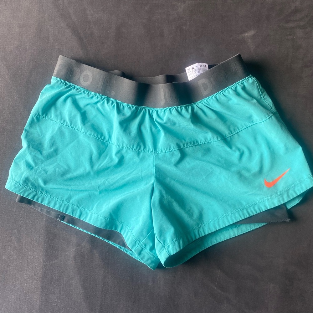 Nike Teal Athletic Shorts with Coral Swoosh